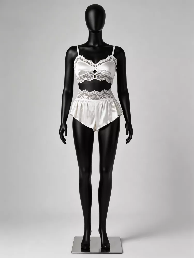 Premium white satin sleepwear set featuring a lace-trimmed bralette with keyhole detail and ruffle shorts with wide lace waistband, OEM factory