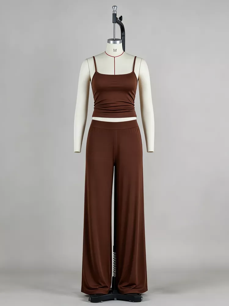 Brown camisole top and wide-leg pants loungewear set at PJGarment production line.