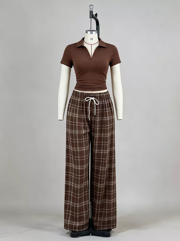 Brown v-neck short sleeve top and plaid pants loungewear set photographed at PJGarment sample room.