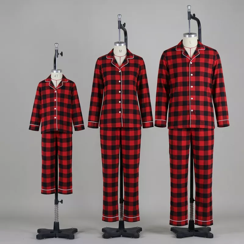 Custom family matching red and black plaid pajama sets from private label manufacturer.