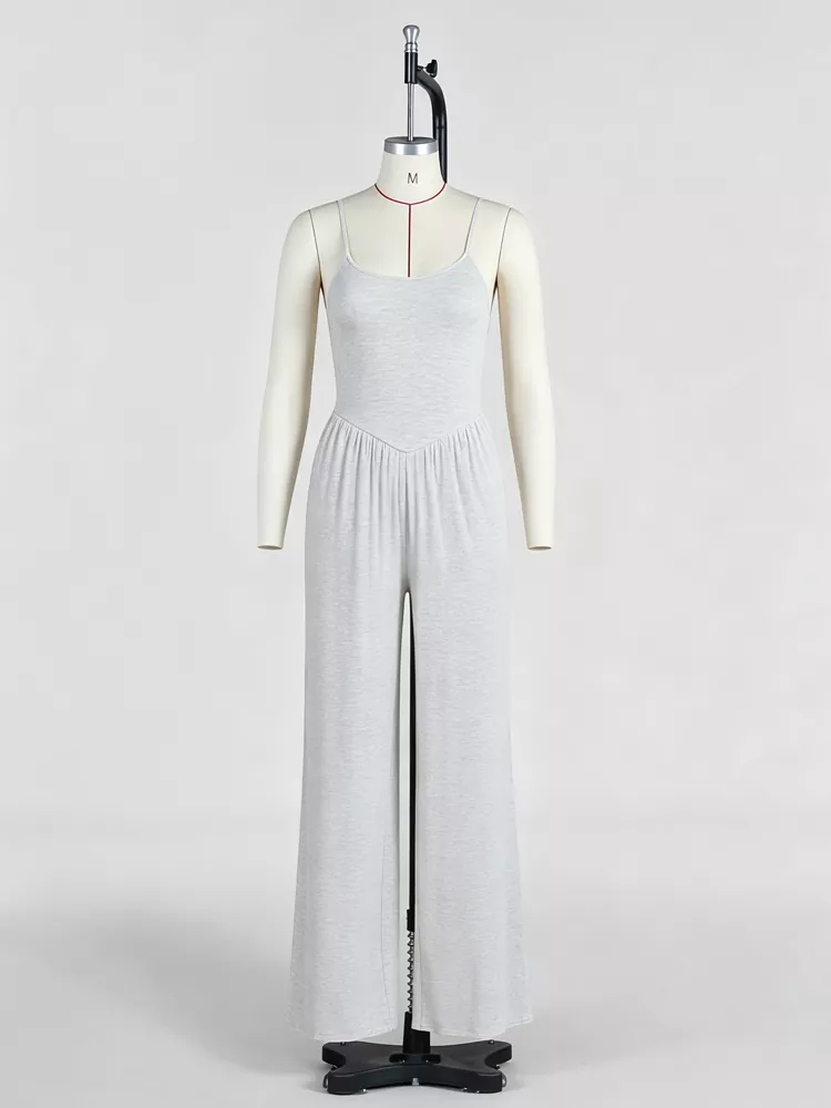 Grey spaghetti strap loungewear jumpsuit on mannequin at PJGarment sewing floor.