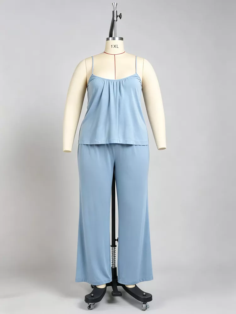 Light blue plus-size camisole and pants loungewear set displayed on a 1XL mannequin at PJGarment factory.